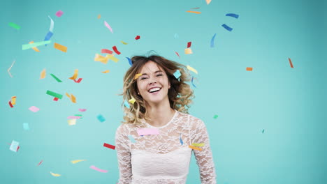 happy woman celebrating with confetti