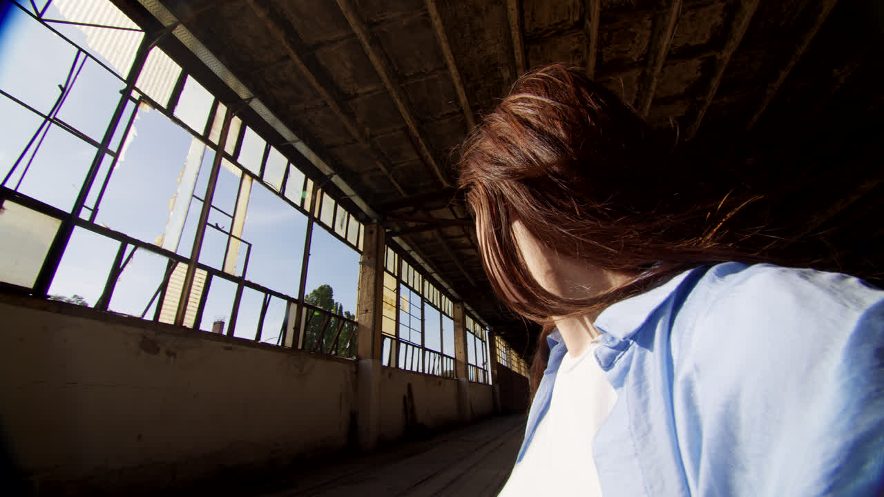 Young Woman in an Abandoned Factory