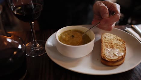 soup and bread with red wine