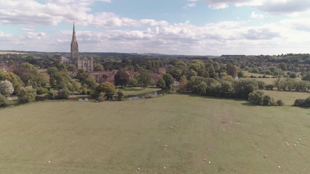 Aerial pan moving from south to north looking at the west side of salisbury cathedral