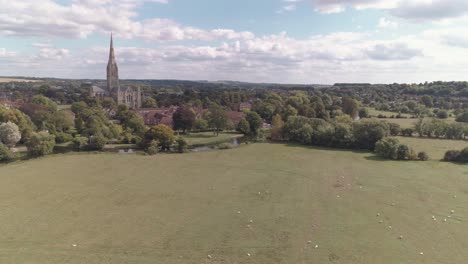 aerial pan moving from south to north looking at the west side of salisbury cathedral