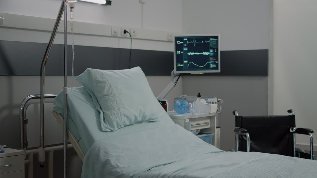 Hospital ward with bed and heart rate monitor at facility