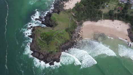 lookout on norries headland with cove - surfing at cabarita beach in nsw, australia