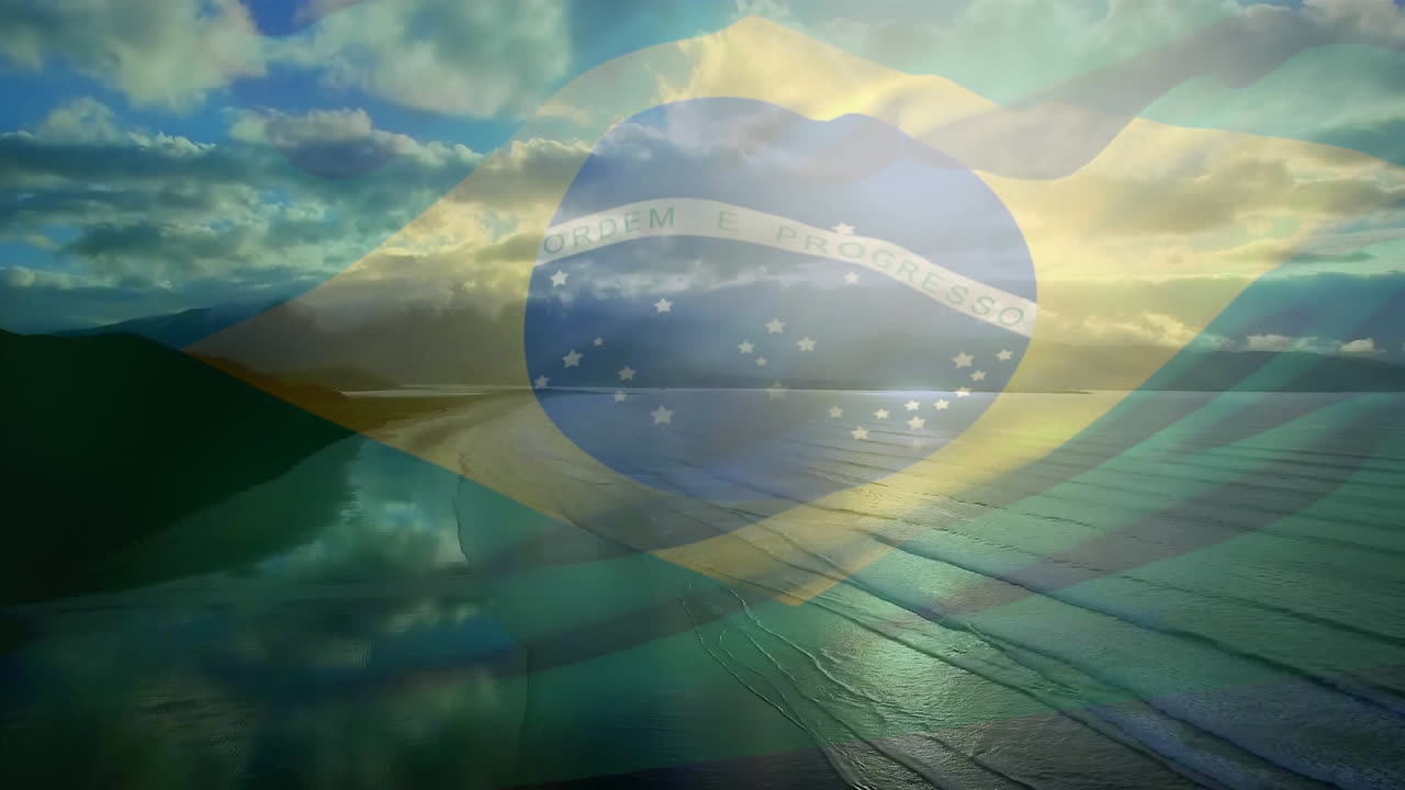 브라질 국기가 해변 풍경, 구름이 많은 파란 하늘과 바다 위에서 흔들리는 애니메이션