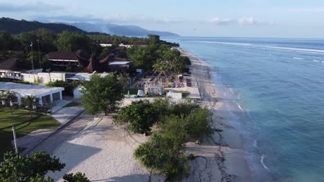 aerial view of a tropical beach resort with clear waters