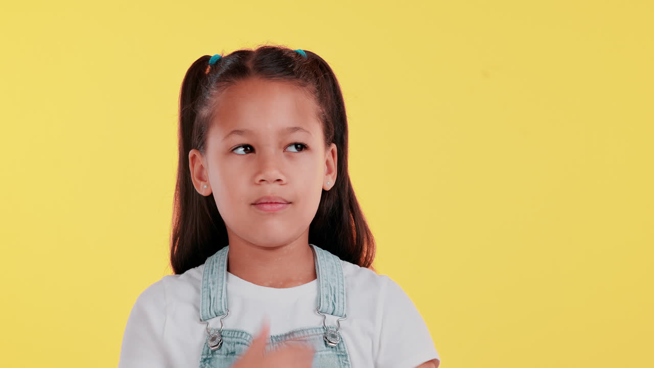 Girl Thinking on Yellow Background