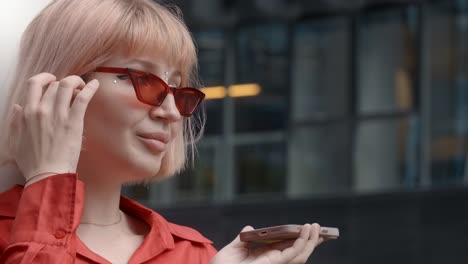 woman talking on phone outside