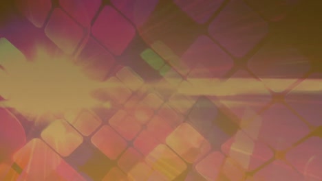animation of pink to brown gradient with squares in background