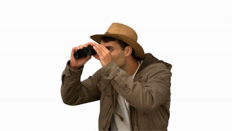 Man-wearing-a-coat-using-binoculars-on-white-screen