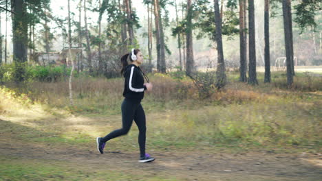 woman running in a forest