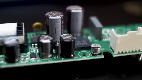 Close-Up-View-Of-Radial-Electrolytic-Capacitors-Mounted-On-PCB