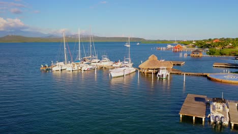 Aerial-shot-at-low-altitude-in-the-bay-of-calderas,-bani,-small-boats,-clear-sky,-shot-with-drone