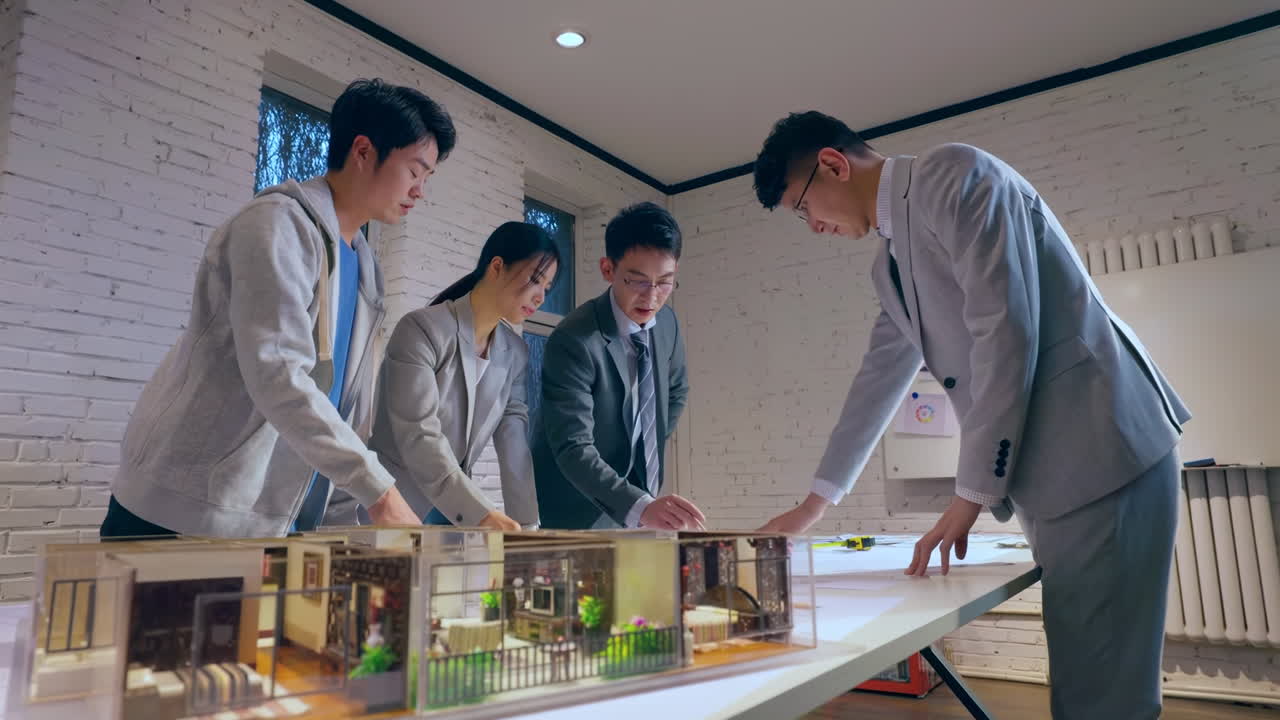 Discussion With Business team including real estate professionals architects and financial experts gathering around a table to discuss and plan a new real estate development project