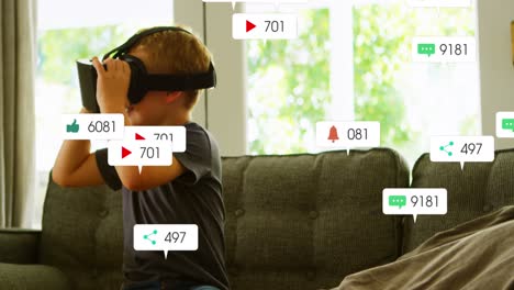 animation of social media icons with numbers over caucasian boy using vr headset