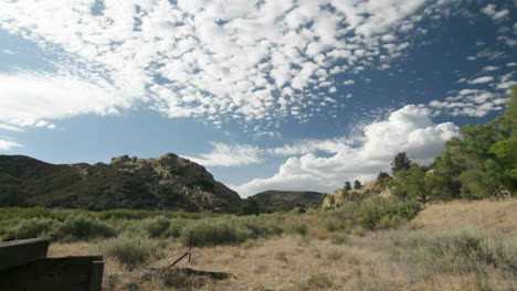 Clouds-move-across-the-sky-above-a-California-mountain-scene