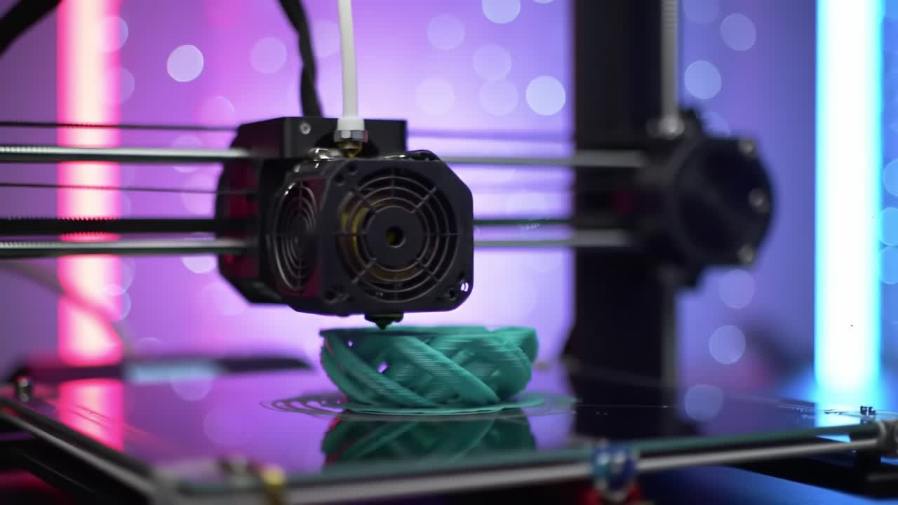 A Captivating Glimpse Into the World of 3D Printing: A High-Tech Printer Fabricating a Complex Design with Vibrant Colors in Motion