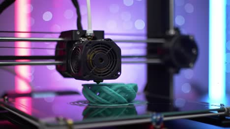 a captivating glimpse into the world of 3d printing: a high-tech printer fabricating a complex design with vibrant colors in motion