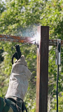 welding a metal fence