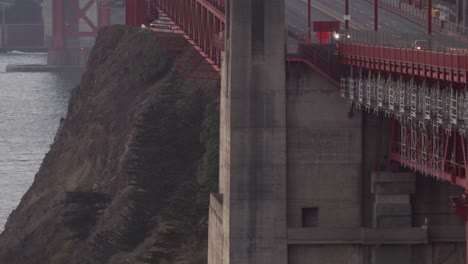 Tilt-shot-of-Cars-Crossing-Golden-Gate-Bridge-in-San-Francisco,-California