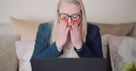 female entrepreneur using laptop in office 6