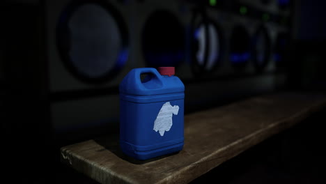 blue laundry detergent bottle in a laundry room