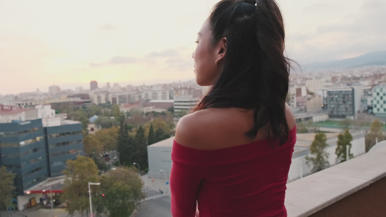 Woman Enjoying City View at Sunset