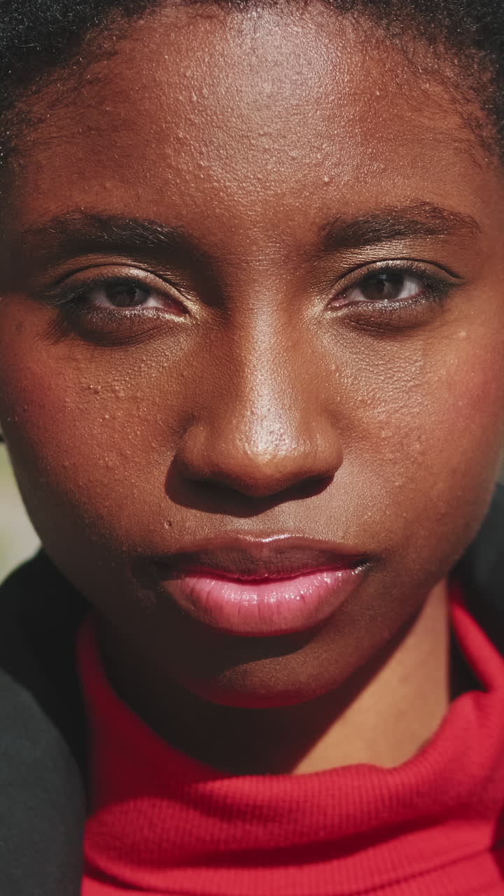 Close Up Portrait of a Young African American Woman Blinking
