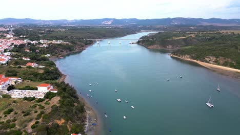 aerial view of blue dragon river, portugal, 4k