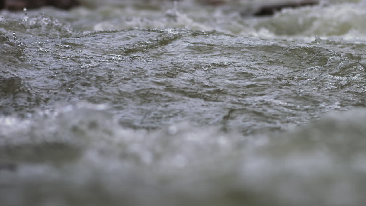 Wide shot of waves in the rapids in Suck Creek in Chattanooga, Tennessee.