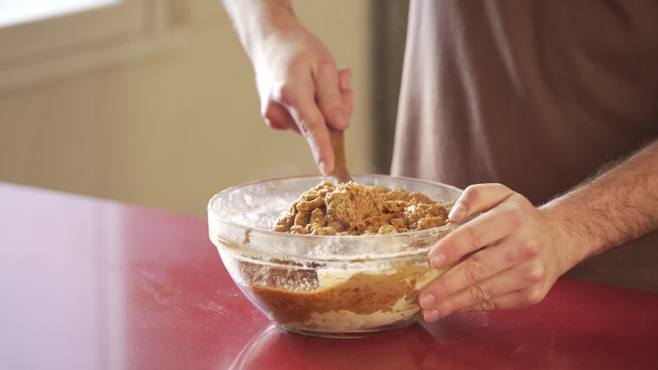 Man making vegan meat. Process, how to cook seitan