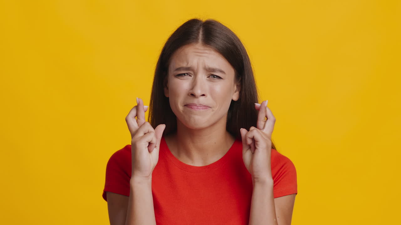 Woman with Fingers Crossed