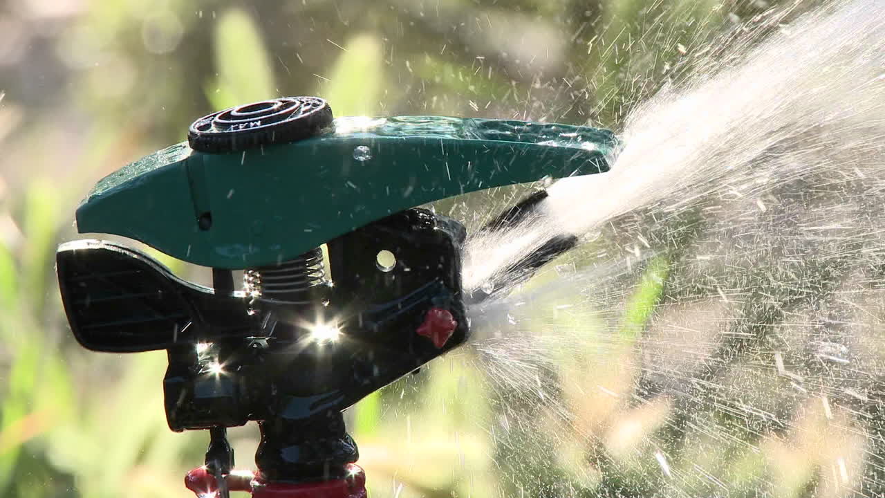 Closeup on a sprinkler shutting off in Oak View California