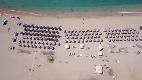 Exotic-beach-in-the-Mediterranean-aerial-pulling-up