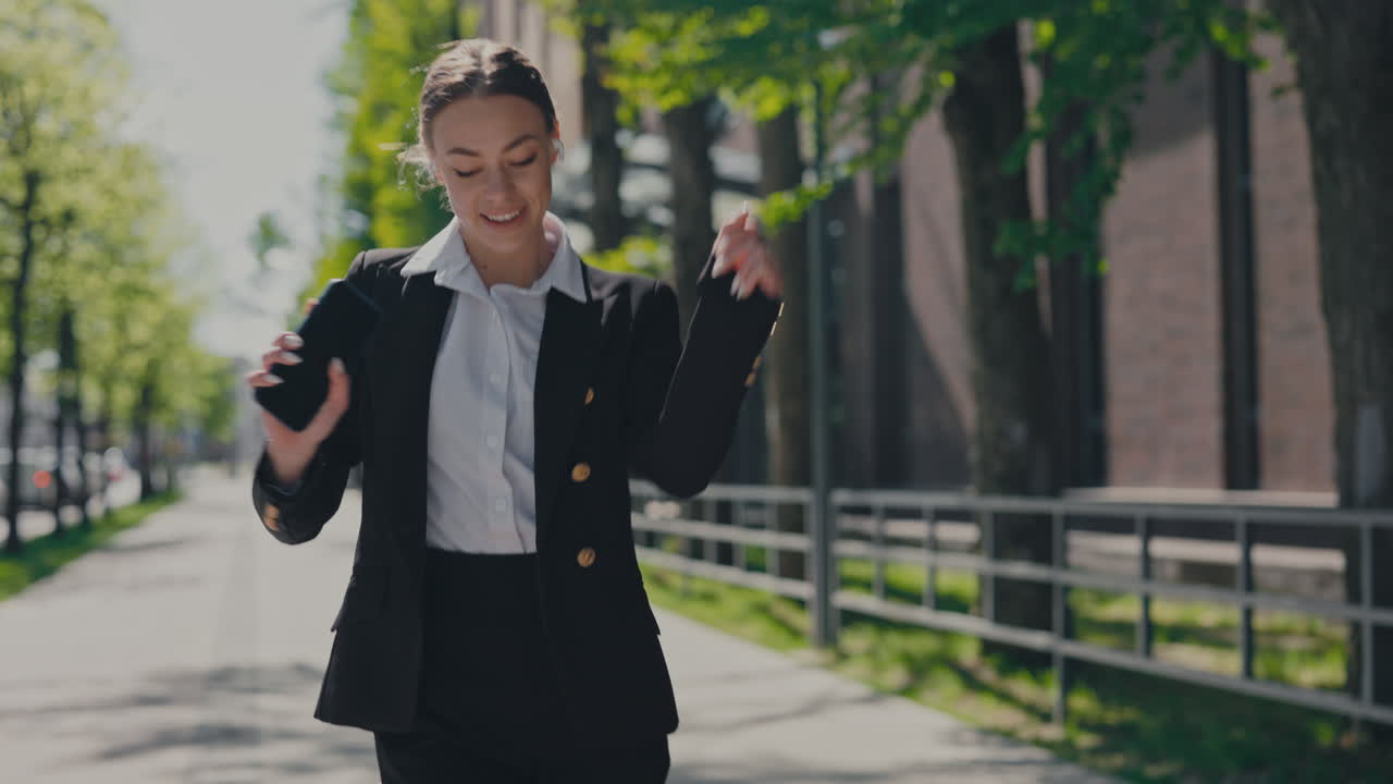 Businesswoman Dancing on the Street