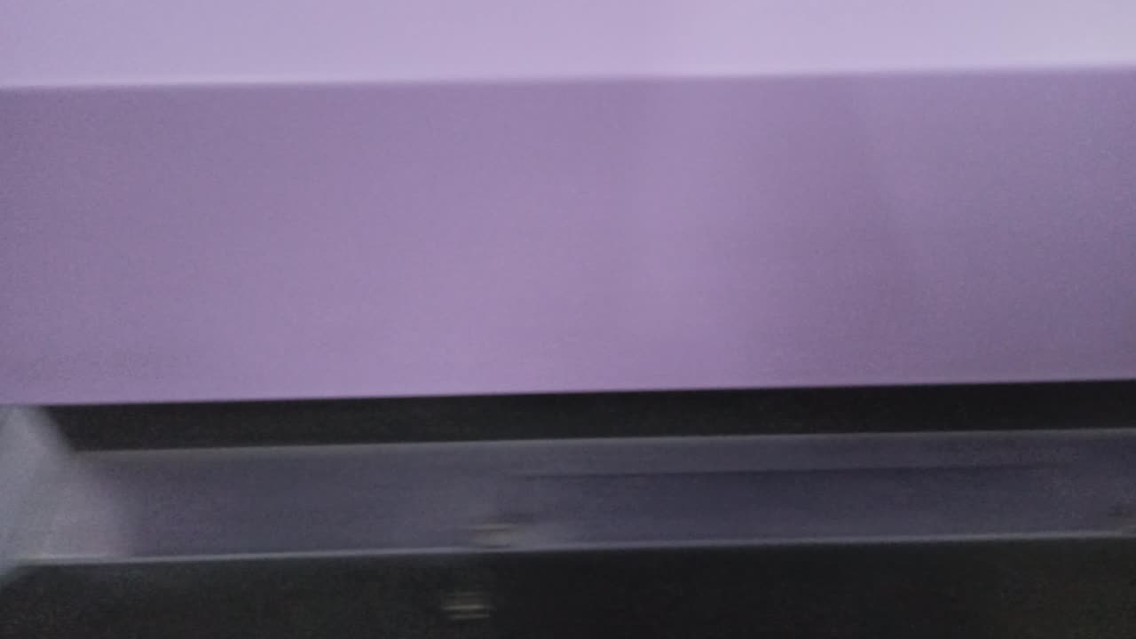 Ultra violet printer at work. Printing photos. Modern technology in action