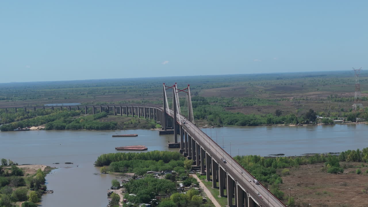 Aerial View of a Long Cable-Stayed Bridge Spanning a Wide River