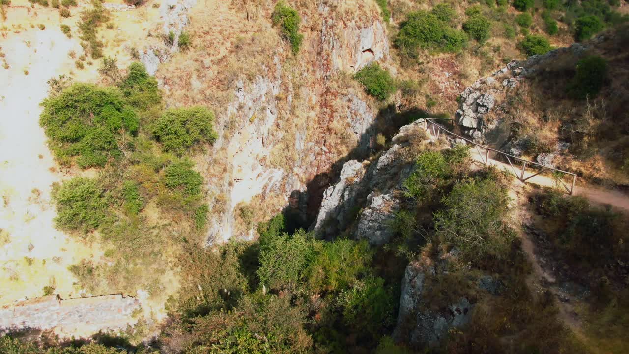 Aerial view of a winding mountain trail near Inkilltambo,K'allachaka and Qhapaq Ñan, Cusco, Peru