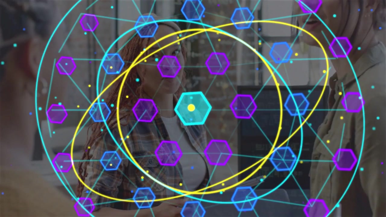 Red-haired presenter holding tablet speaking while cyan, purple hexes emerging to visualize data