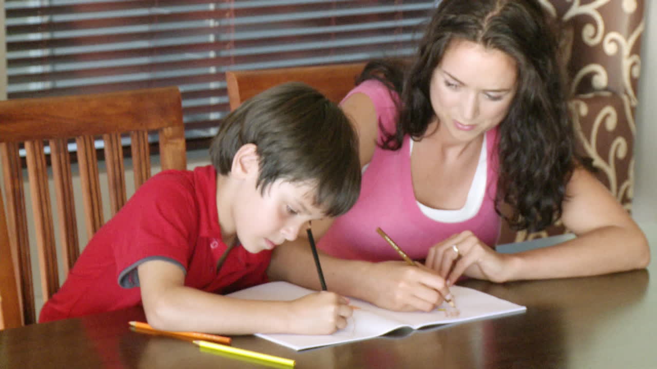 Mother painting with her son 2