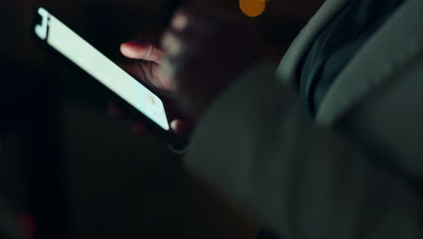 Business-hands-scroll-smartphone-at-night