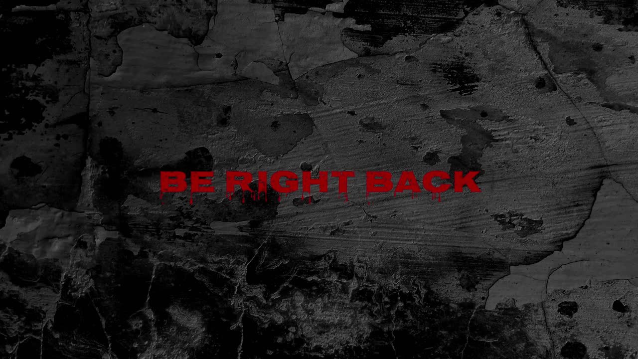 Flickering Horror Style 'Be Right Back' Text on Grungy Wall