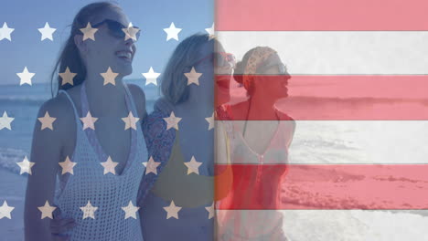 animation of flag of usa over happy diverse female friends on beach in summer