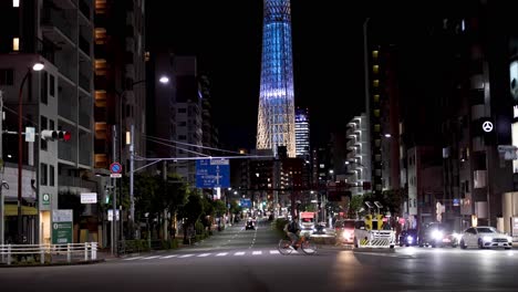 nighttime view of a vibrant city street