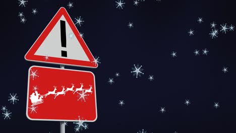 Animation-of-snow-falling-over-christmas-road-sign-on-black-background