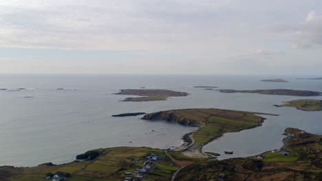 establishing shot of small islands in clifden bay. sky road, connemara. aerial