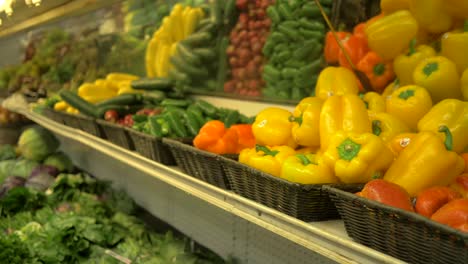 4K-Fall-Harvest-Bell-Peppers-Cucumbers-Squash-Market-Fresh-Grocery-Store-Produce-Slider-Shot