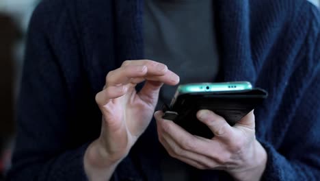 making-payment-on-mobile-phone-holding-mobile-phone-shopping-online-with-people-stock-video-stock-footage