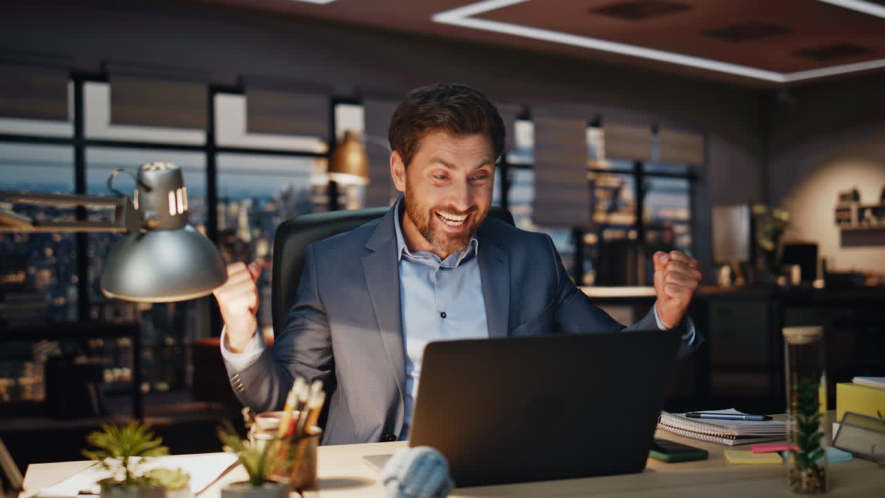 Business man feeling success working laptop dark office closeup. Happy director