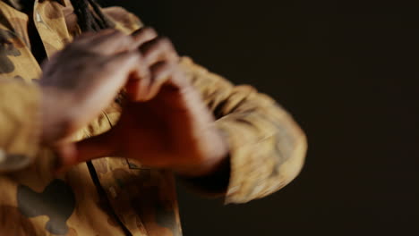 male model showing heart shape sign on camera