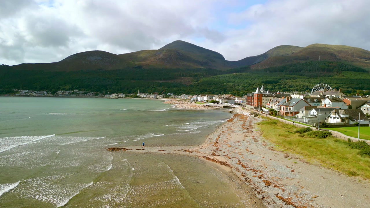 Reversing aerial video of Newcastle beach in County Down, Northern Ireland. Produced in 4K, 60FPS and with Rec709 color.